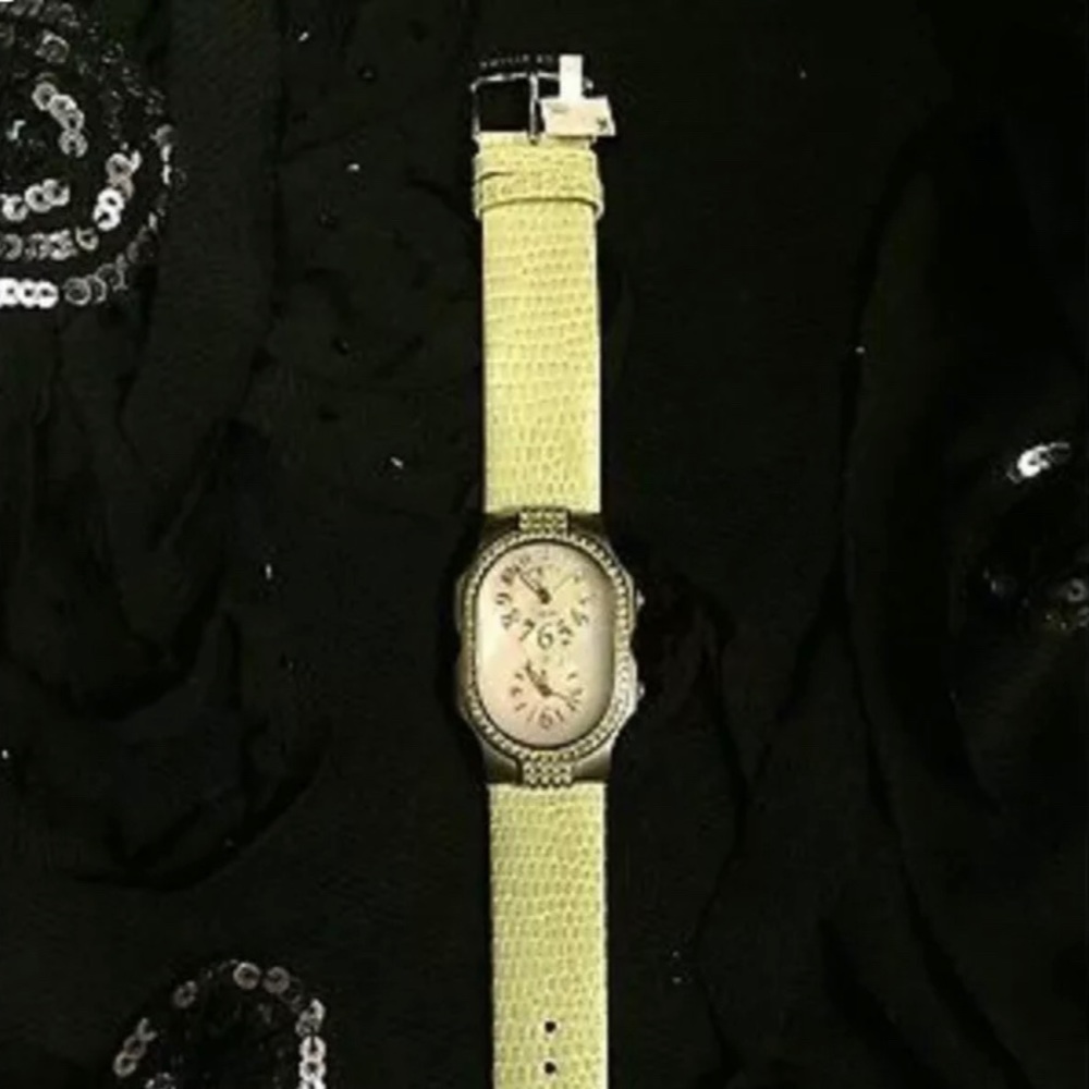 NWT phillip stein teslar mop w/green Swarovski.